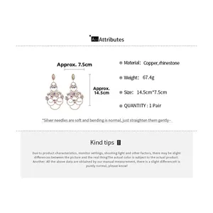 Spécifications de taille pour boucles d'oreilles fleurs ajourées avec détails glands
