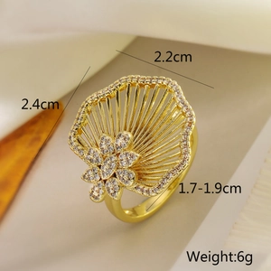 Macro shot showing 18K gold-plated geometric ring details and zircon floral design