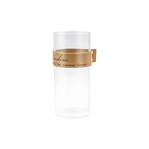 Vaso da fiori minimalista in vetro trasparente con cinturino in pelle marrone e decori