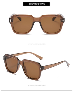 Detail view of brown square sunglasses with CE and UKCA quality marks on the temple