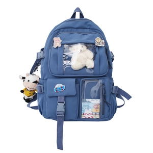 Zaino scolastico in nylon blu con finestra trasparente, orsetto di peluche e spille