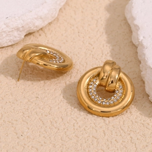 Detailed macro view of 18K gold plated hoop earrings with double row sparkling zircon stones