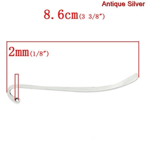 Detail view of antique silver metal bookmark with 8.6cm length and 2mm width specs