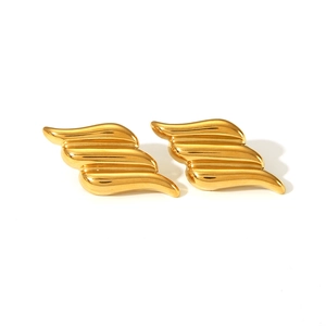 Detailed close-up of golden stainless steel angel wing stud earrings on white background