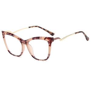 Fashion cat-eye glasses with brown tortoiseshell frame and golden wavy metal temples