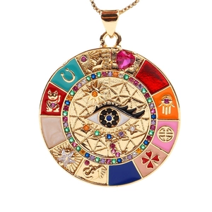 Bohemian evil eye pendant necklace with colorful enamel lucky symbols on gold chain