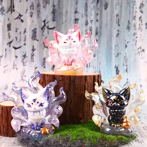 Three Nine-Tailed Fox statues in pink, purple, and black with a glossy finish for desk decor
