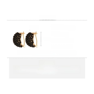 Detail view of retro black resin C-shape hoop earrings with size measurements