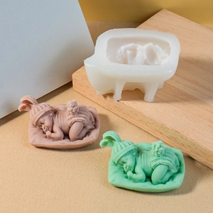Silicone mold for sleeping baby candles with cute bunny ear hats and bathtub design
