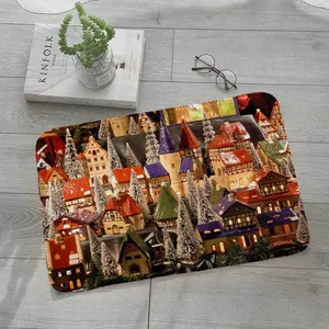 Detailed view of square Christmas village bath mat on grey wooden floor with home decor