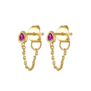 Macro view of gold chain drop earrings featuring teardrop-shaped pink zircon stones