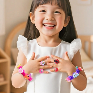 Kids DIY silicone bracelet and ring set featuring colorful cartoon animal charms for girls