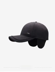 Close-up of the fleece-lined earflaps and sport logo on the warm winter wool baseball cap