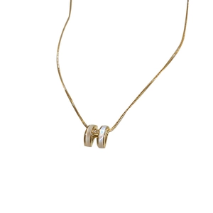 Gold-plated necklace with H-shaped shell pendant and zircon stones for women
