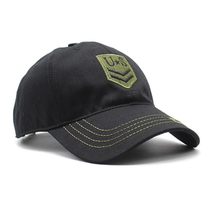 Detail of tactical cotton baseball cap with US army shield embroidery and green stitching