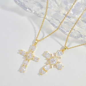 Elegant gold-plated cross necklace set with sparkling micro-pave cubic zirconia crystals