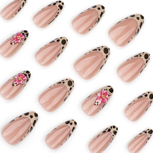 Short almond press-on nails with French leopard print and 3D floral accents on white background