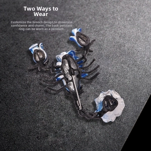 Detail of scorpion brooch with back pendant loop for dual-use functionality