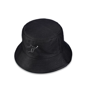 Detail of black cotton bucket hat showing white heart hand line art and stitched brim