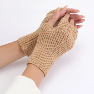 Detailed knit texture of camel fingerless gloves with ribbed cuffs for winter warmth