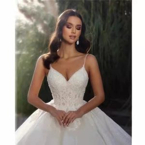 Elegant satin wedding dress with spaghetti straps, lace embroidery and sequins