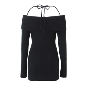Detail of black ribbed knit mini dress with off-shoulder neckline and halter tie straps