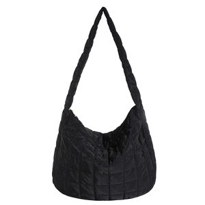 Black quilted puffer tote bag made of lightweight nylon with thick shoulder straps
