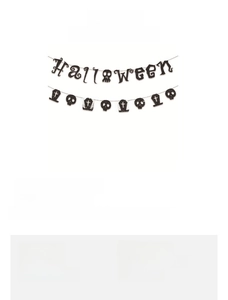 Detail of glittery Halloween banner featuring spooky coffin and skull elements