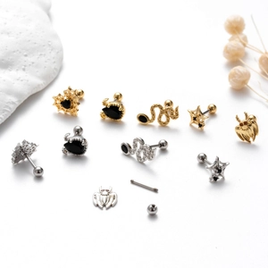 Set di piercing in acciaio chirurgico oro e argento con motivi a ragno e corona reale