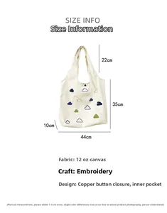 Detailed size specifications for off-white canvas tote bag with cloud embroidery and dimensions