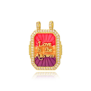Detail of square gold pendant with Love is the Answer text and colorful enamel inlay
