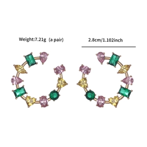 Detail view of gold C-shaped earrings with colorful zirconia gems and size dimensions