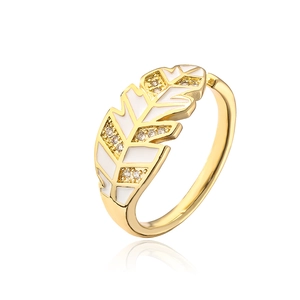 Detail showing leaf ring with white enamel finish and zircon stones in gold plating