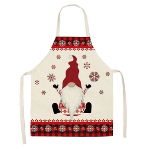Christmas gnome apron with red black plaid pattern and snowflakes on linen texture