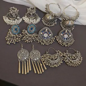 Ethnic vintage silver drop earrings set with crystals and bohemian tassel charms