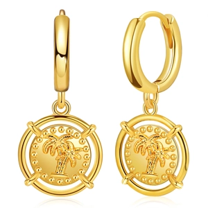 Detail of 18K gold-plated hoop earrings with tropical palm tree embossed round charms