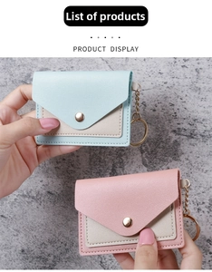 Detail view of mini card holders in candy colors with lychee texture and keychain