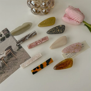 Set of 2 irregular wave and marble acetate hair clips for women in elegant Morandi colors
