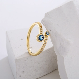 Adjustable 18K gold plated evil eye ring with blue enamel and sparkling cubic zirconia