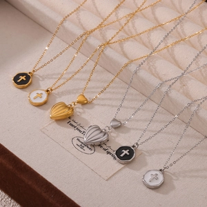 Cross pendant and heart tassel necklace set in gold and silver stainless steel