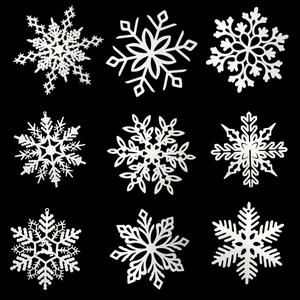 Set of 9 white plastic snowflake ornaments in various designs for Christmas tree decor