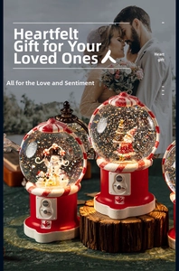 Detailed view of red Christmas snow globe with Santa and Snowman in gashapon style