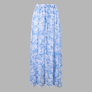 Detail of high waisted floral maxi skirt with elastic waistband and blue botanical print