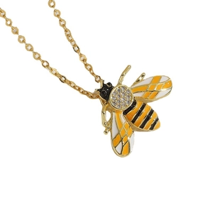 Minimalist bee pendant necklace with yellow drip oil and sparkling zircons in 14K gold plating