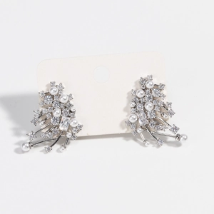 Elegant silver starburst pearl stud earrings with sparkling crystals for women