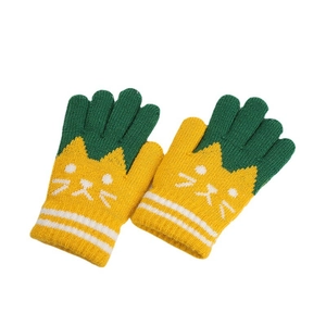 Winter knit gloves for kids featuring a yellow cat design with green fingertips