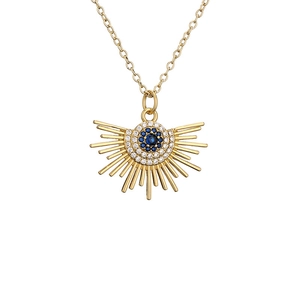 Golden sunburst necklace featuring a central blue gemstone and pavé cubic zirconia
