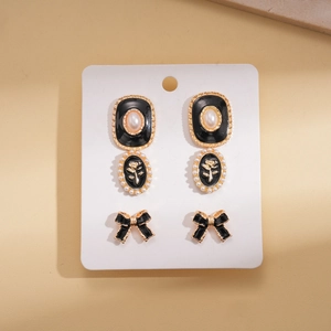 Vintage black enamel earring set with pearl oval drops and butterfly studs for women