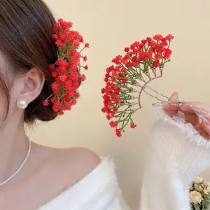 Elegant red flower hair pin with gold metal base for women in classic floral style