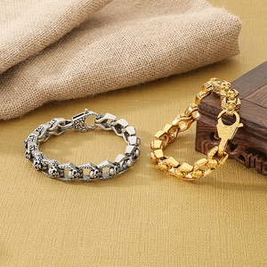 Punk style skull head thick chain bracelet in gold and antique silver stainless steel